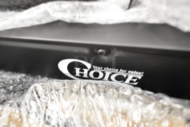 New Choice portable butane stoves wrapped in protective packaging, featuring brass burners. Visible Choice logo on the surface.