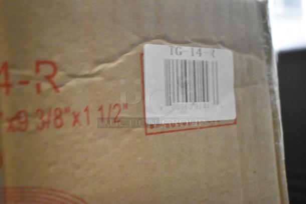 Cardboard box labeled "TG-14-R" with visible dimensions and barcode, containing scratch and dent items.