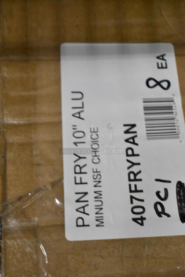 Box label showing "PAN FRY 10" ALU," "MINUM NSF CHOICE," and "407FRYPAN." Auction for new scratch and dent items.