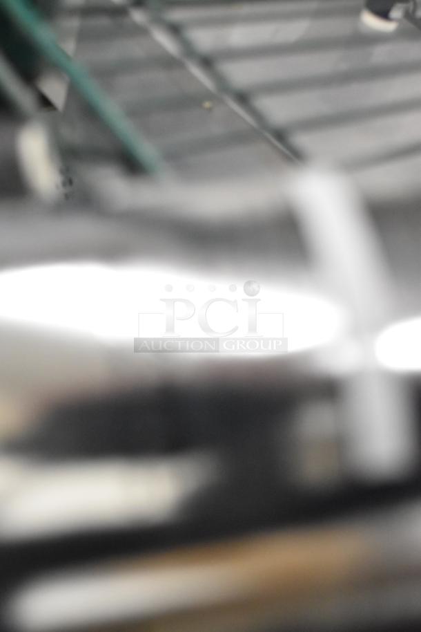 Blurry image; not possible to describe the Pentair Everpure i2000 Water Filtration System.