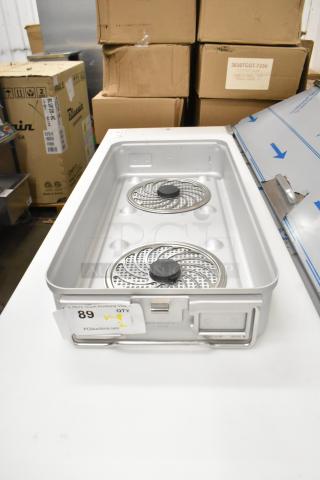 Brand new Aesculap JN440 metal bin, condition: scratch and dent. Includes multiple components, marked for auction.