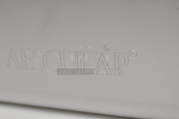 Aesculap JN440 metal bin, brand new condition, visible logo embossed on surface, scratch and dent item, auction double lot.