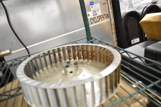 Brand new Nidec motor, 208-240V, 1 phase, scratch and dent condition. Cyclopentane label visible.
