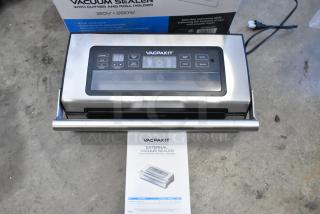 BRAND NEW VacPak-It VSM12PRO vacuum sealer with 12" seal bar, cutter, roll holder. 120V, 1 Phase. Slight scratch and dent.