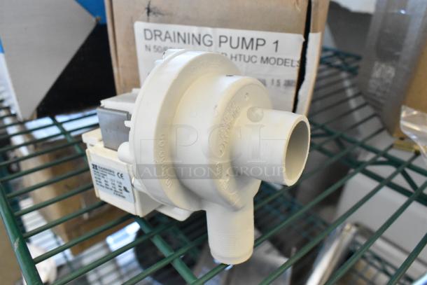 MainStreet Equipment draining pump, new condition, for HTGW/HTUC models. Marked 1N 50/60Hz, 38W. Includes original box.