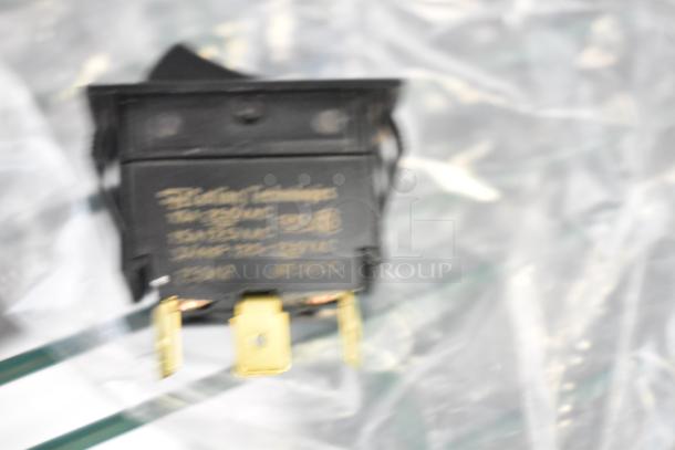 Blurred electrical component with labels; part of MainStreet Equipment draining pump and Regency cold faucet body set; new condition.