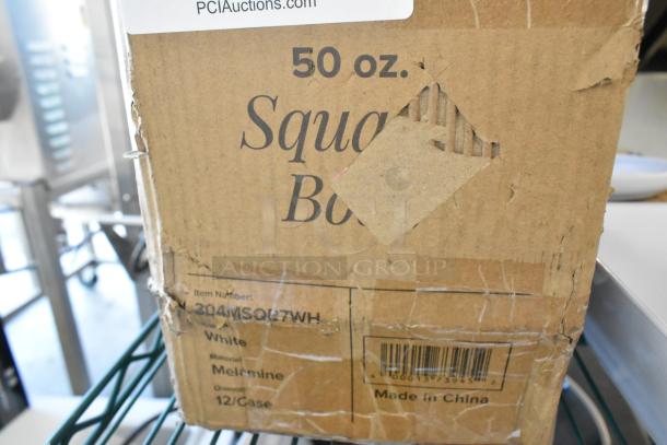 Cardboard box labeled "50 oz. Square Bowl," item number 304MSQB7WH, contains white melamine bowls, 12 per case.