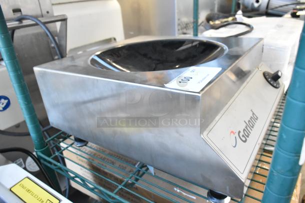 Garland SH/WO 3500 stainless steel single burner wok induction range, electric, 208V, 1 phase. Appears in good condition.