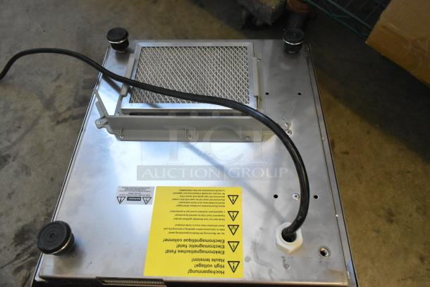 Garland SH/WO 3500 stainless steel induction range, single burner, electric, 208V, 1 phase, visible caution labels.