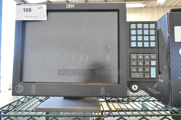 IBM 4820-51G Monitor, black, with touchscreen and keypad. Appears in good condition. Auction tag number 105 visible.