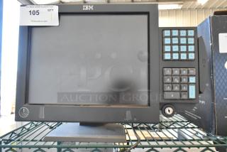IBM 4820-51G Monitor, black, with touchscreen and keypad. Appears in good condition. Auction tag number 105 visible.