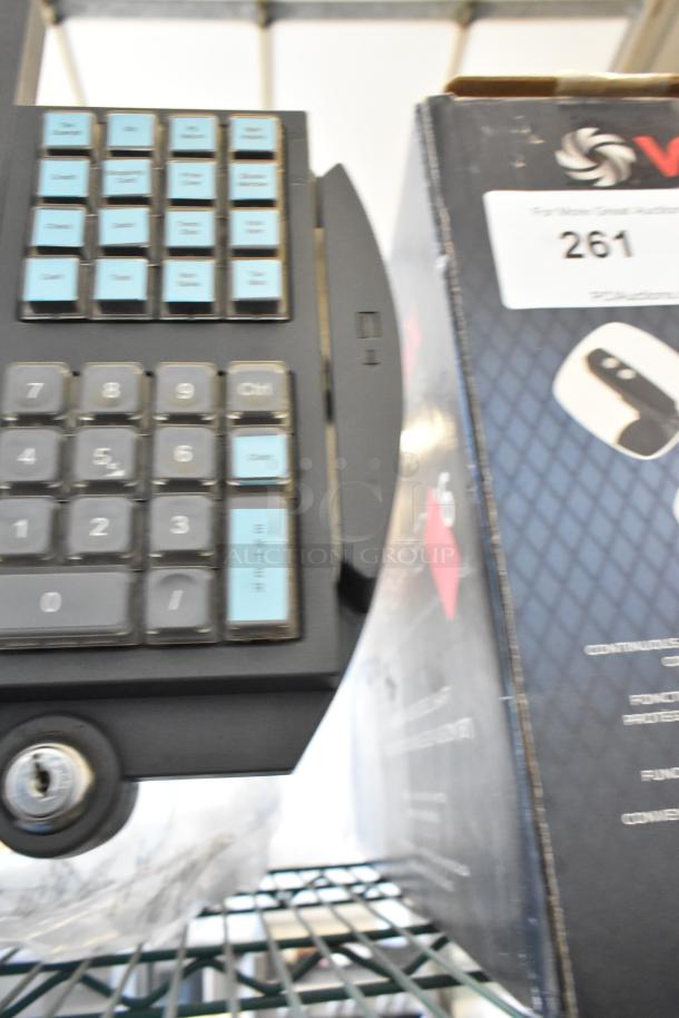IBM 4820-51G Monitor, partial view with keypad. Box visible alongside. Condition unknown. Ideal for vintage computing.