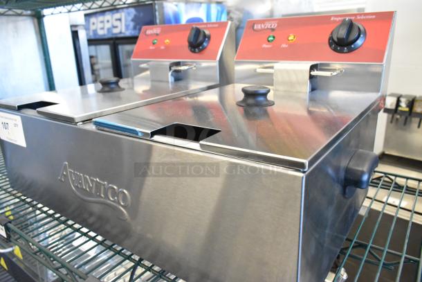 Brand new 2024 Avantco 177F102 dual tank electric countertop fryer, stainless steel, 20 lb capacity, with 2 metal lids.
