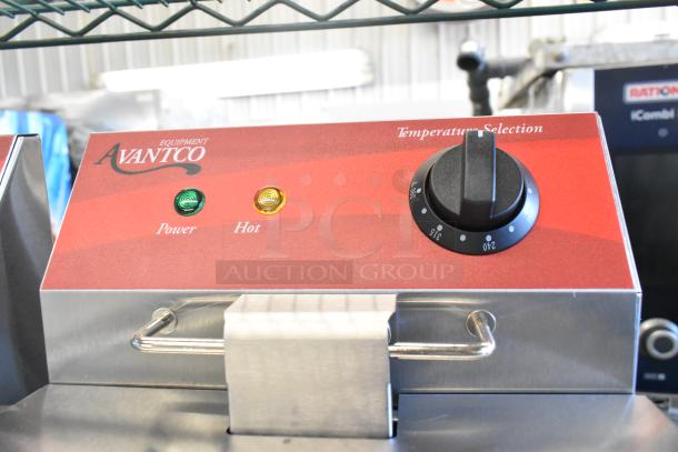 Avantco 177F102 stainless steel commercial dual tank fryer, new condition. Displays power and temperature controls.