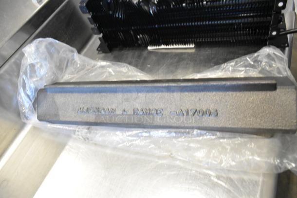 Brand new Avantco 17818115 evaporator coil for 27" AU and AWT Series, shown with minor scratches. Marking reads "AMERICAN RANGE A17003."