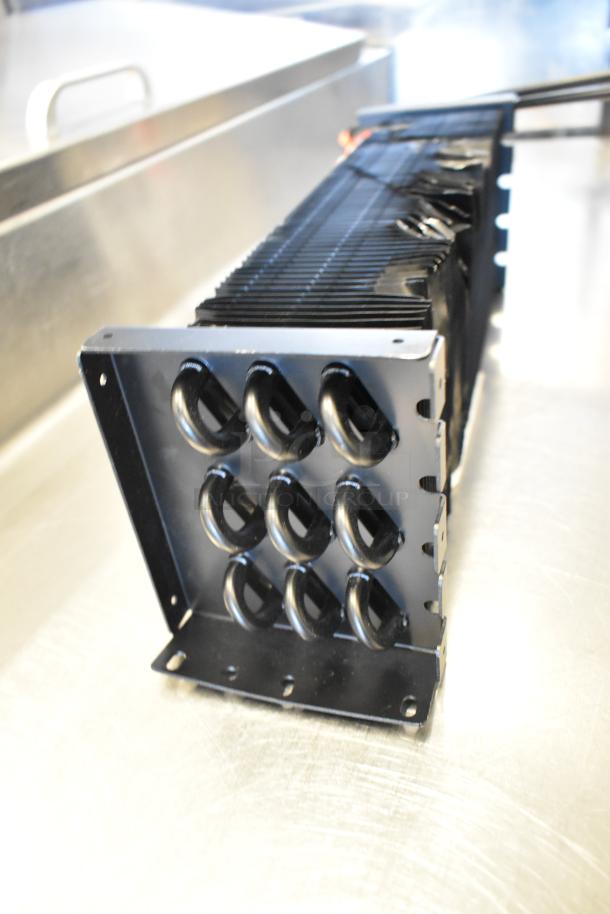 Brand new Avantco 17818115 evaporator coil for 27" AU and AWT Series, scratch and dent condition, black metal fins.