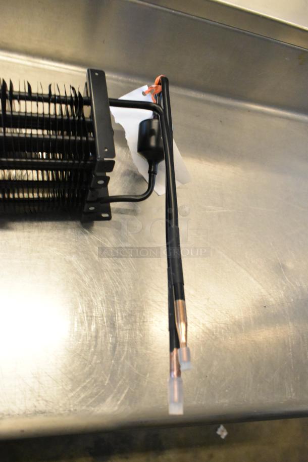BRAND NEW Avantco 17818115 evaporator coil for 27" AU/AWT Series, minor scratches on surface, visible copper connectors.