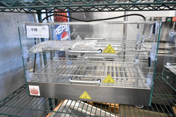 Brand new Carnival King 382HDSG2A hot food display case, silver, glass, 2 shelves, caution markings, 120 volts, 1 phase.