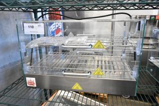 Brand new Carnival King 382HDSG2A hot food display case, silver, glass, 2 shelves, caution markings, 120 volts, 1 phase.