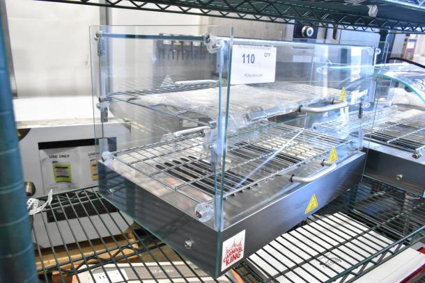 Brand new Carnival King 382HDSG2A hot food display case with silver finish, two shelves, and scratch and dent condition.