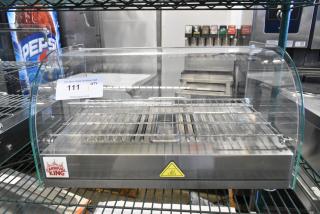 BRAND NEW Carnival King 382HDCG1A Silver Hot Food Display Case, curved glass, 1 shelf, 120V, 1 Phase, scratch and dent condition.