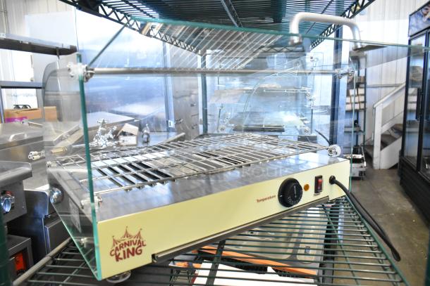 Brand new Carnival King 382HDCG1A hot food display case, silver curved glass, single shelf, 120V, 1 phase, minor scratches.