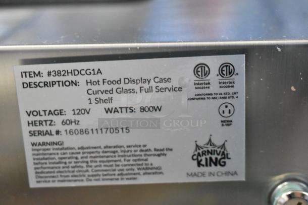 Brand new Carnival King 382HDCG1A hot food display case, silver curved glass, 120V, 1 shelf, scratch and dent condition.