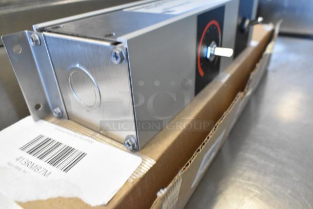 Brand new Hatco RMB-7M Control Box 413RMB7M, in packaging. Barcode visible. Includes Avantco axle assembly.