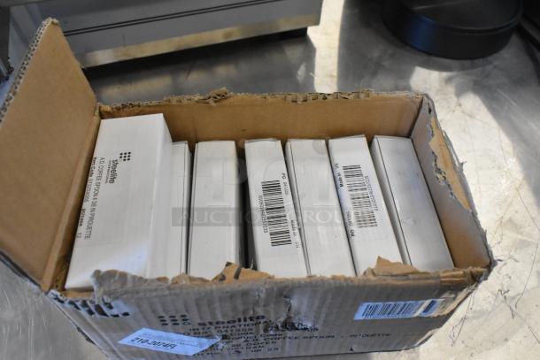 Box of Steelite 5732SX005 coffee spoons, 18/10 stainless steel, scratch and dent condition, labeled packaging visible.