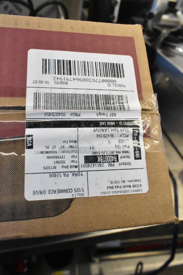 Box containing San Jamar R4000TBK Twin 9" Jumbo Tissue Dispenser, labeled "Brand New Scratch and Dent."