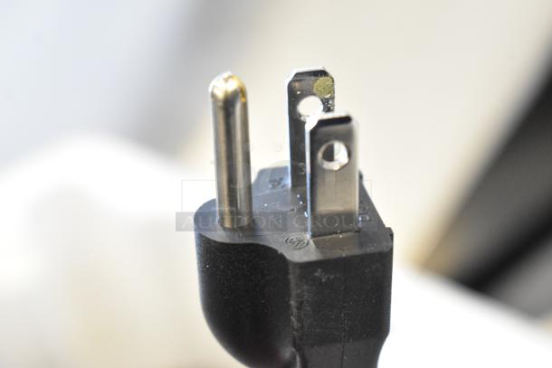 Power plug of a Robot Coupe MP 350 Turbo Immersion Blender, 120 Volts, 1 Phase, brand new with minor scratches.