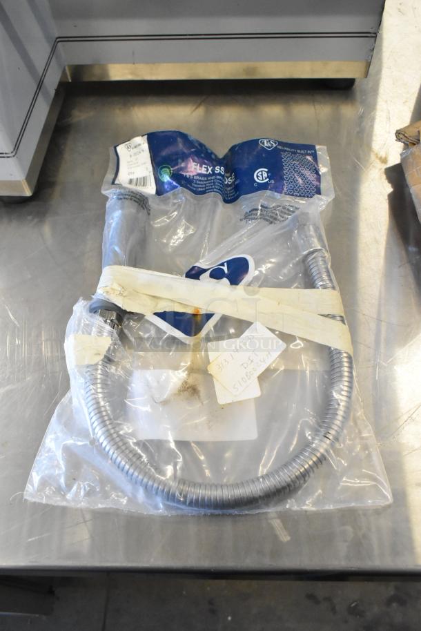 "Brand new T&S B-0024-H flexible hose in original packaging. Includes label showing part details and codes."