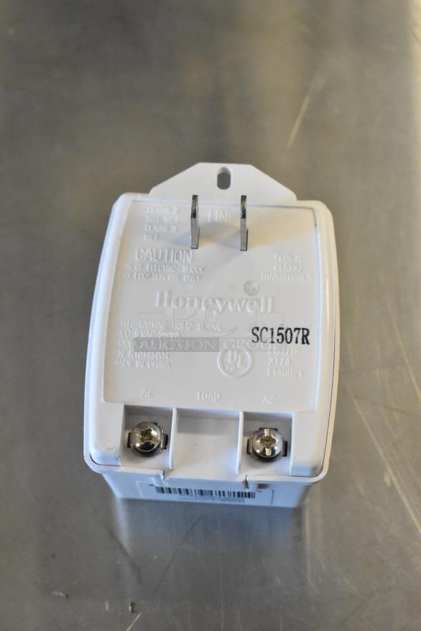 Honeywell K10145WH Class II Transformer, 120VAC input, 9VAC output, UL listed, with visible caution markings.