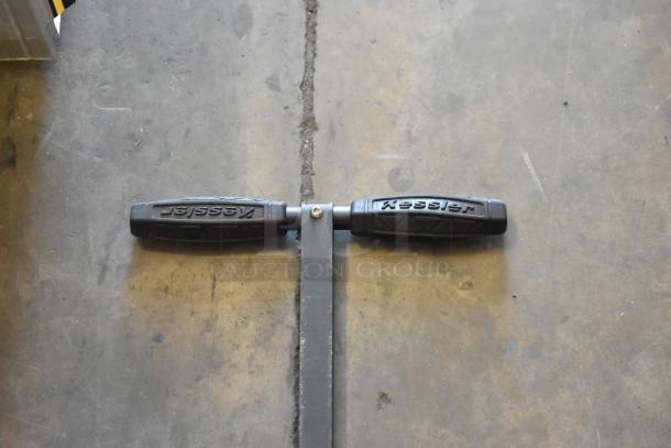 Kessler branded faucet handle with black grips on metal base; suitable for plumbing use.