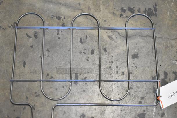 HPG010431 Garland/US Range G01043-1 upper element in good condition, metal construction, attached labeled tag.