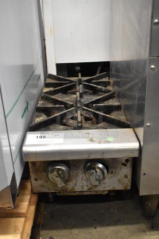 Stainless steel commercial countertop gas 2-burner range with visible wear, dual control knobs, and auction tag 195.