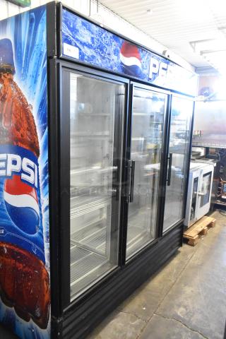 True GDM-72 metal commercial 3-door cooler, Pepsi branding, poly-coated racks, 115 volts, 1 phase, clean condition.
