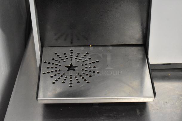 Keurig K150 coffee maker drip tray with stainless steel star design, lightly used.
