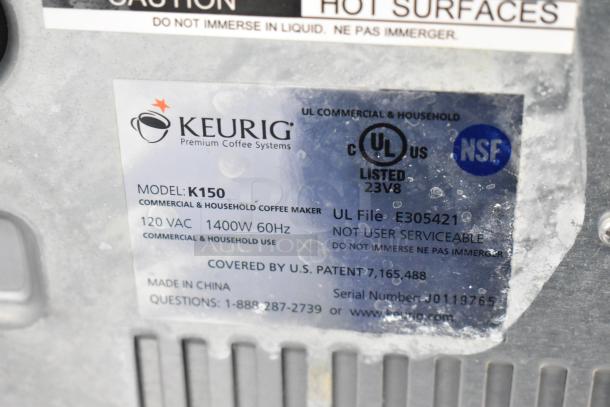 Keurig K150 coffee maker label, showing model K150, 120 VAC, 1400W, UL listed, NSF certified; made in China.