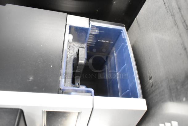 Keurig K150 coffee maker, top view of water reservoir with "Max Fill" marking, in good condition.