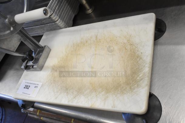 Nemco metal countertop vegetable slicer on mount, used condition with visible wear marks. Auction tag: item 202.
