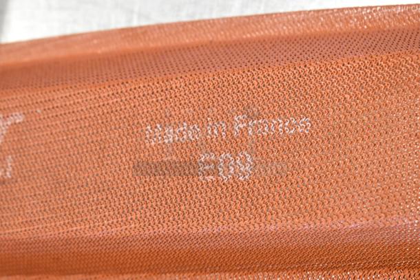 62 baking pan liners, various sizes including 4 loaf and 5 loaf, marked "Made in France", orange silicone mesh.