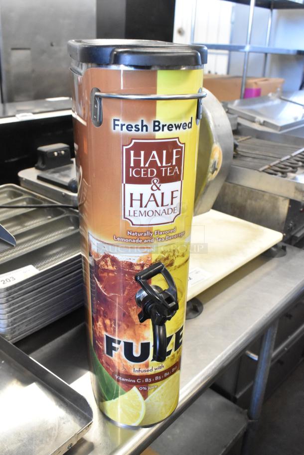 Three Bunn TDO-N-3.5 stainless steel iced tea dispensers, featuring "Half Iced Tea & Half Lemonade" label, excellent condition.