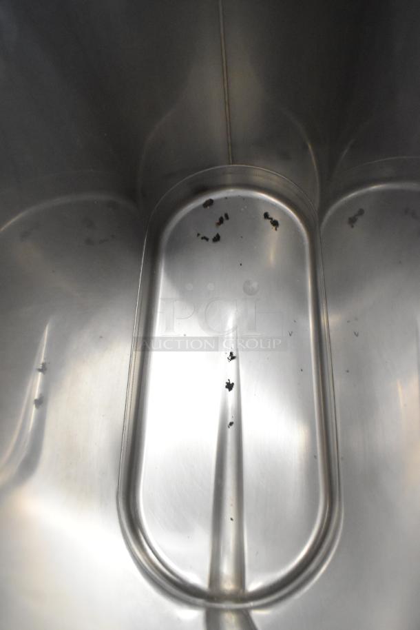 3 Bunn TDO-N-3.5 stainless steel iced tea dispensers, showing interior condition with some residue.