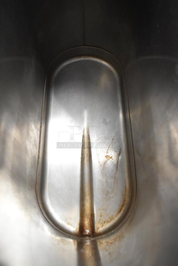Bunn TDO-N-3.5 stainless steel iced tea dispenser interior, showing wear and patina indicative of use.