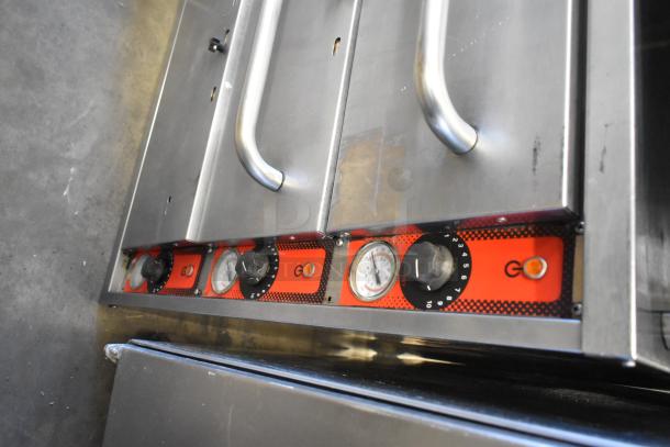 Vulcan stainless steel commercial warming drawer with three drawers, 208/250 volts, temperature controls, visible handles.