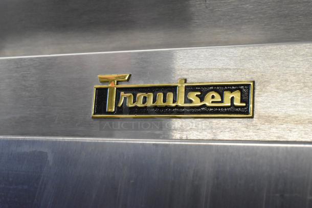 Traulsen AHT132WUT-FHS Stainless Steel Commercial Refrigerator, 24.2 Cu. Ft., 115V, 1 Phase. Brand logo detail.