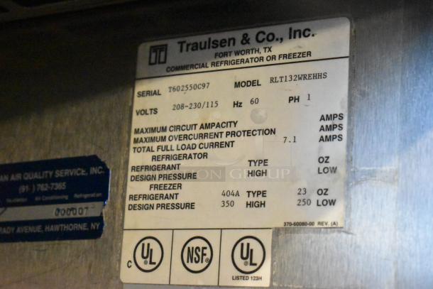 Label on Traulsen RLT132WREHHS stainless steel commercial refrigerator, showing specs, UL and NSF certifications.