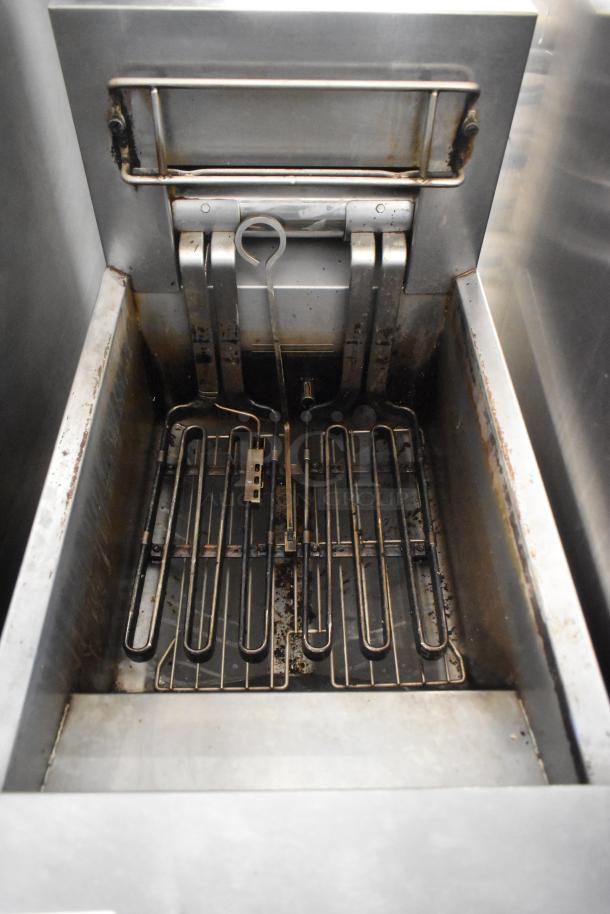 2018 Frymaster RE114TCSC stainless steel floor fryer, 208V, 3-phase; visible signs of use, interior heating elements shown.