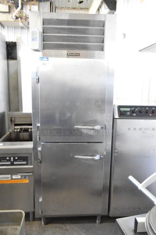 Traulsen RHT132WREHHS stainless steel commercial refrigerator, two half doors, on casters, 115 volts, 1 phase.